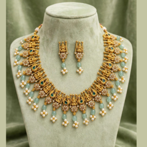 Gold-Plated Temple Lakshmi Devi Necklace Set with Peacock, Emerald Green, Mint Beads & Pearl Drops - With Matching Lakshmi Earrings