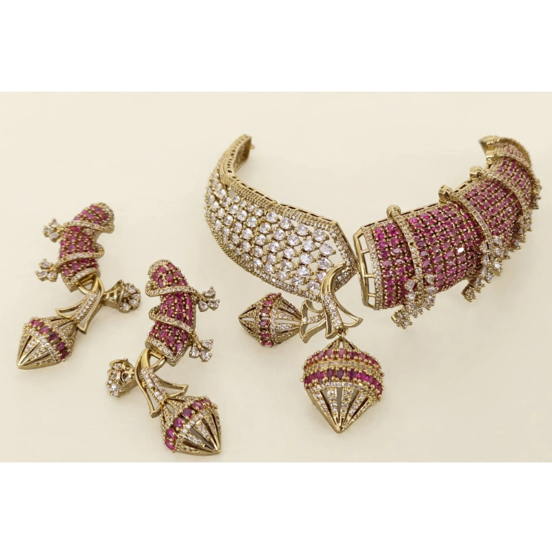 Gold-Plated Ruby Pink & White AD Hasli Choker Necklace Set with Jhumka Drop Pendant - With Matching Long Earrings.