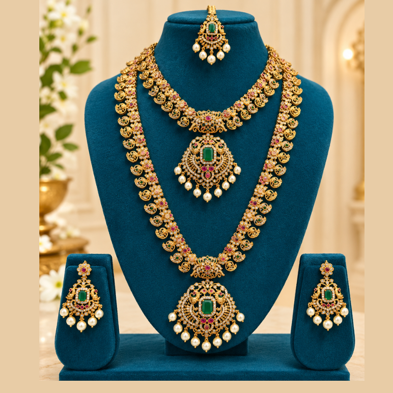 Elegant Gold Necklace Set with Emerald Stones and Pearl Drop